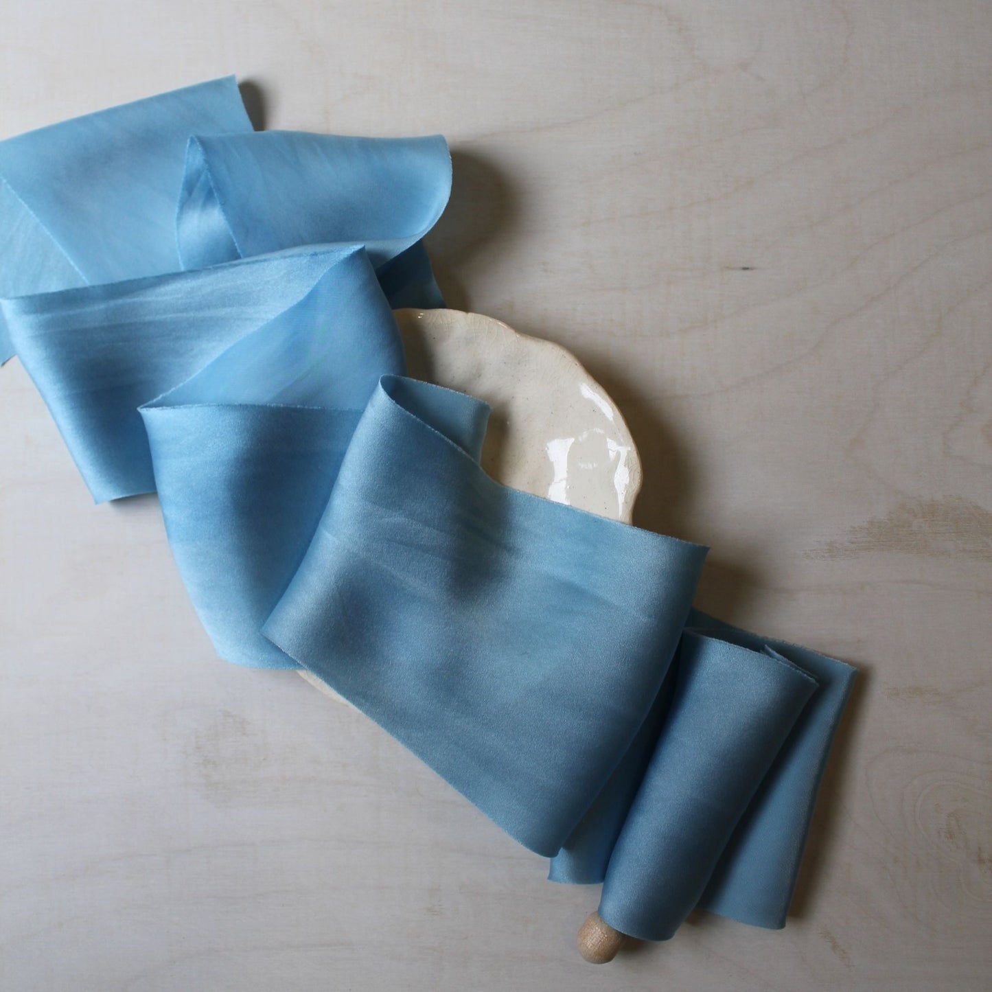 Soft and luminous pale blue silk ribbon for weddings, hand-dyed with indigo by a Canadian small business
