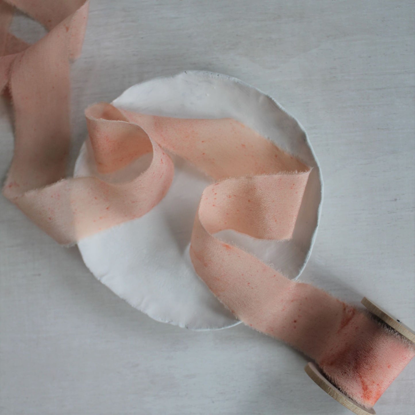 Naturally dyed crepe silk ribbon in soft blush tones